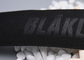 परिधान कस्टम लोगो पॉलिएस्टर बद्धी पट्टियाँ उभरा हुआ 35 मिमी काला