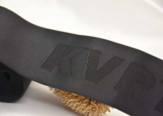 डबल पक्षीय सामग्री के साथ कस्टम ब्रांडेड लोगो 52 मिमी जैक्वार्ड लोचदार बैंड