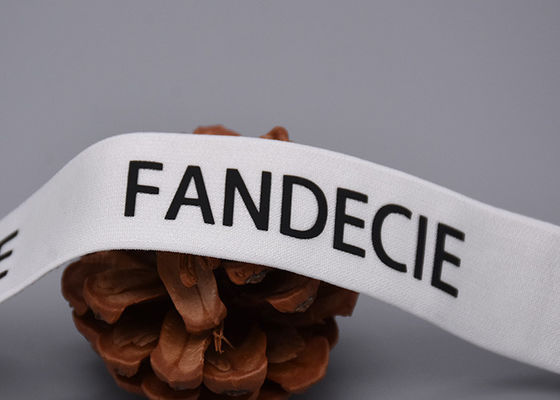 गारमेंट्स स्वनिर्धारित लोचदार बैंड मैट ब्लैक लोगो के साथ मुद्रित: